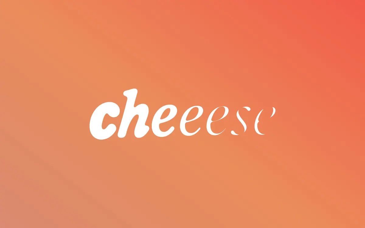 Écran d’accueil du site de Cheeese : le logo « cheeese » en blanc sur un dégradé orangé